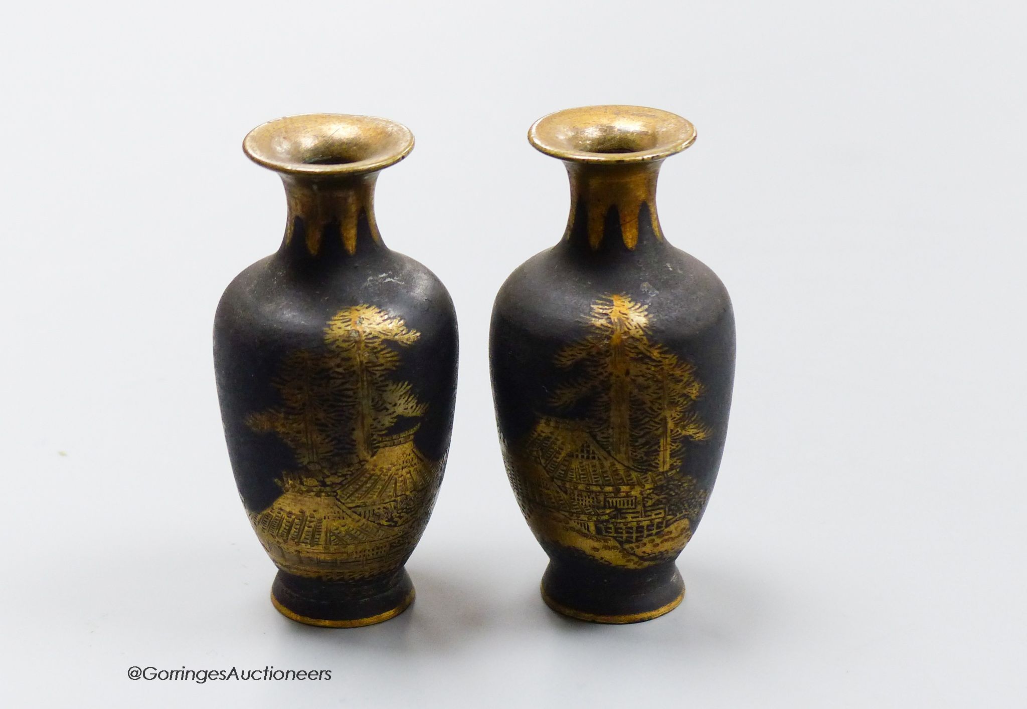 A pair of Japanese Komai style damascened iron miniature vases, height 6cm